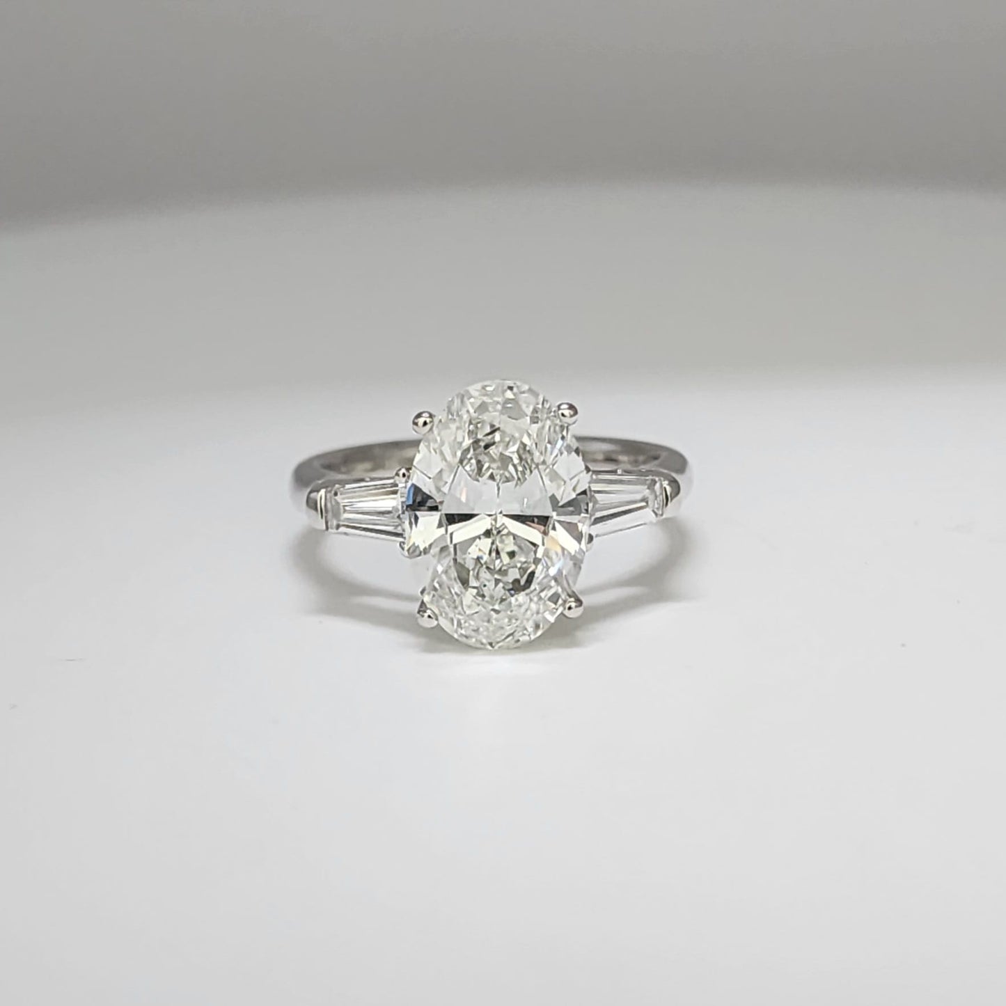 18K White Gold Lab Grown Oval Diamond Ring with Baguette Side Diamonds