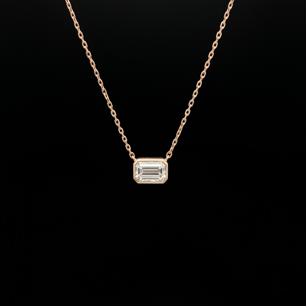 Emerald cut diamond necklace black background